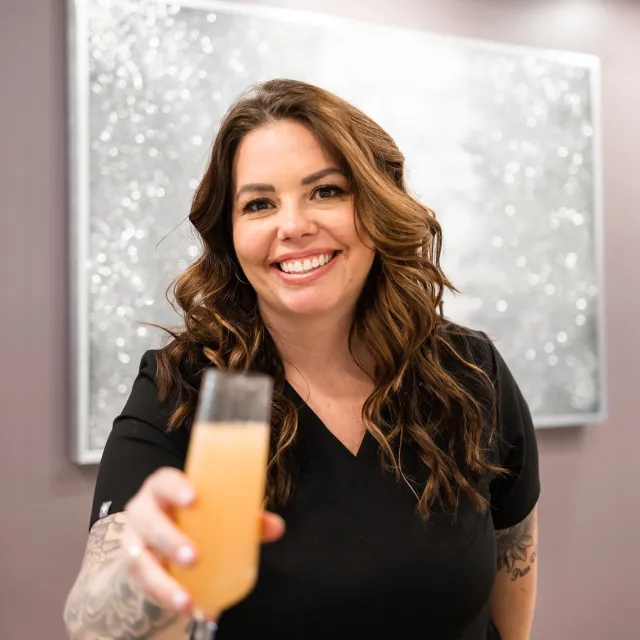 Brookes with wine glass